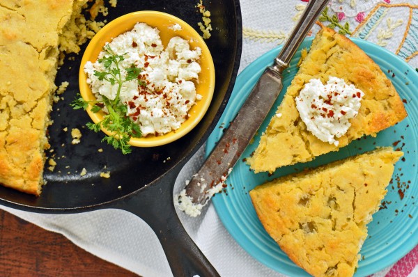 "Cornbread gets a hint of tang from goat cheese and a touch of spiciness from green chiles in this recipe for Cornbread with Goat Cheese and Green Chilies"